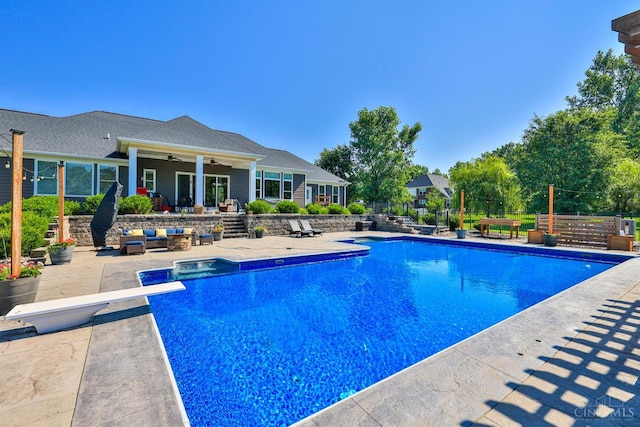 7948 Red Fox Trl, Hamilton Twp, OH 45152 - swimming pool featuring a patio, an outdoor hangout area, a ceiling fan, and a diving board