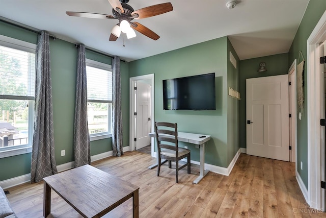 7948 Red Fox Trl, Hamilton Twp, OH 45152 - office space with healthy amount of natural light, a ceiling fan, and light wood finished floors