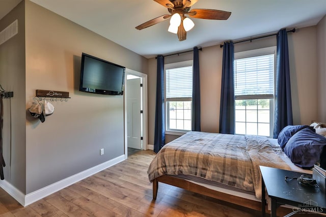 7948 Red Fox Trl, Hamilton Twp, OH 45152 - bedroom featuring light wood-style flooring and ceiling fan