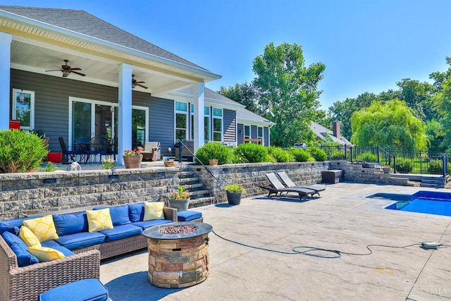7948 Red Fox Trl, Hamilton Twp, OH 45152 - view of patio with an outdoor living space with a fire pit and ceiling fan