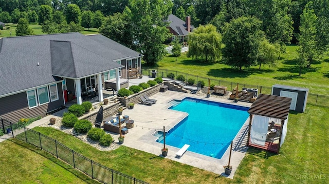 7948 Red Fox Trl, Hamilton Twp, OH 45152 - view of swimming pool with an outdoor living space, a fenced backyard, a patio area, and a diving board