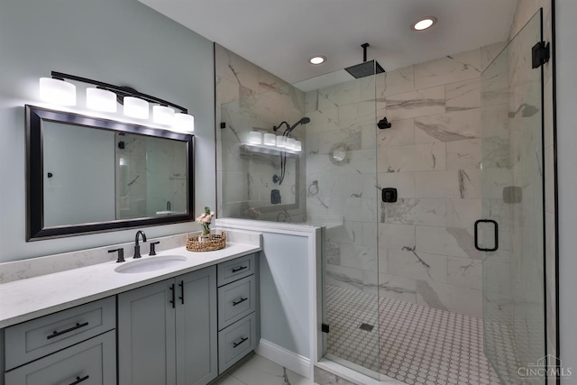 7948 Red Fox Trl, Hamilton Twp, OH 45152 - full bathroom with marble look tiles, recessed lighting, a shower stall, and vanity