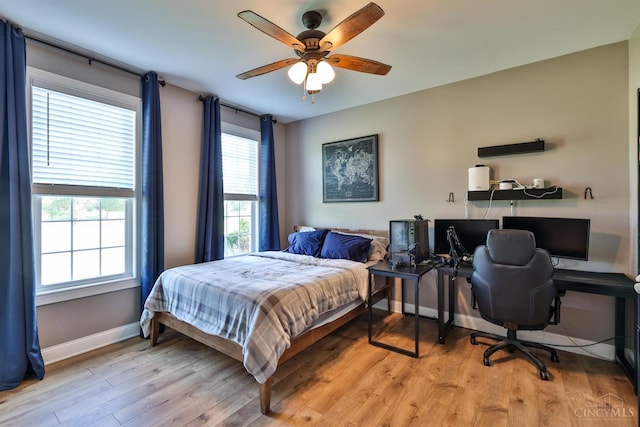 7948 Red Fox Trl, Hamilton Twp, OH 45152 - bedroom featuring light wood-style floors and a ceiling fan