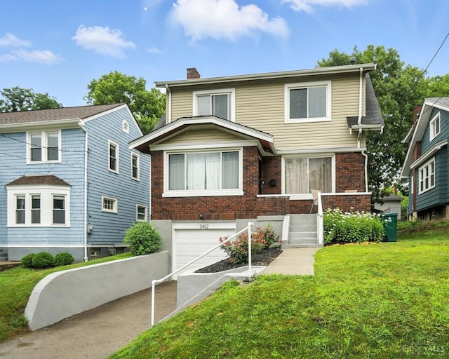 3462 Wabash Ave, Cincinnati, OH 45207 - view of front of home with a garage, driveway, a chimney, a front lawn, and brick siding