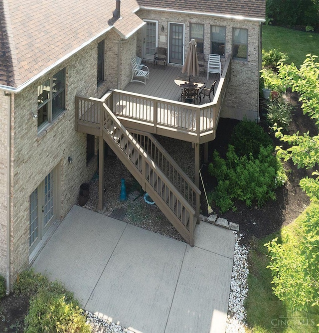 3893 Jocelyn Dr, Fairfield Twp, OH 45011 - back of house featuring a deck, brick siding, and a shingled roof