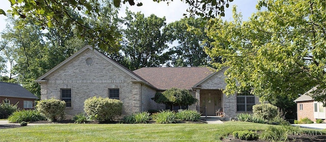 3893 Jocelyn Dr, Fairfield Twp, OH 45011 - view of front of house featuring a front lawn and brick siding