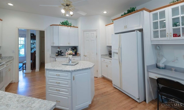 3893 Jocelyn Dr, Fairfield Twp, OH 45011 - kitchen featuring white refrigerator with ice dispenser, a ceiling fan, white cabinetry, light wood-style flooring, and recessed lighting