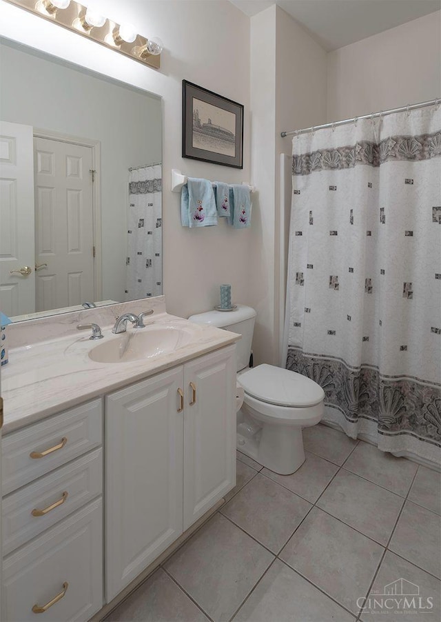 3893 Jocelyn Dr, Fairfield Twp, OH 45011 - bathroom featuring vanity, tile patterned floors, and a shower with curtain