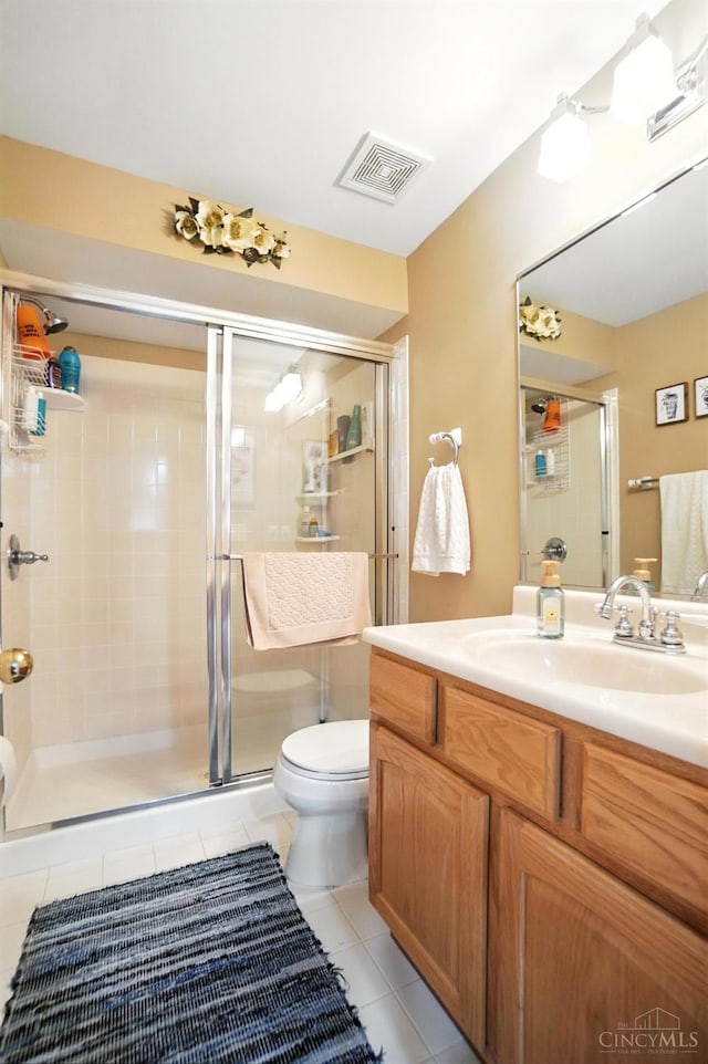 8608 Sunmont Dr, Anderson Twp, OH 45255 - bathroom with vanity, tile patterned floors, and a stall shower