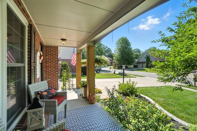 8608 Sunmont Dr, Anderson Twp, OH 45255 - porch with a lawn