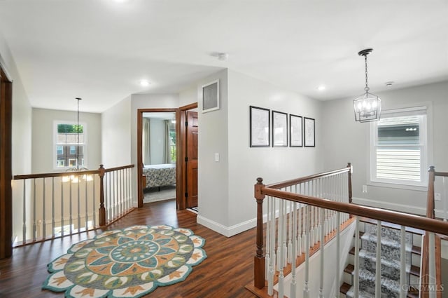 8608 Sunmont Dr, Anderson Twp, OH 45255 - hallway featuring an upstairs landing, a chandelier, wood finished floors, and recessed lighting