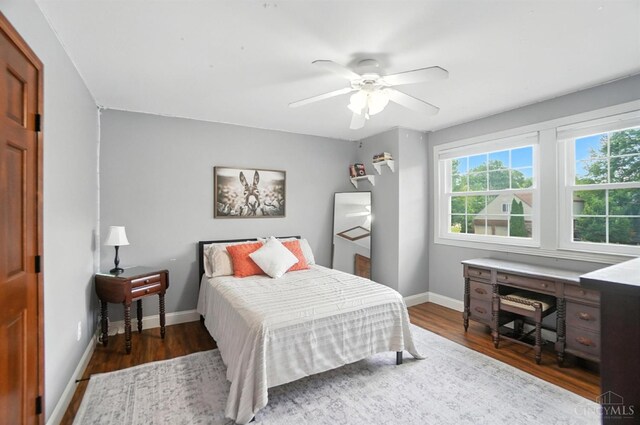 8608 Sunmont Dr, Anderson Twp, OH 45255 - bedroom with wood finished floors and a ceiling fan