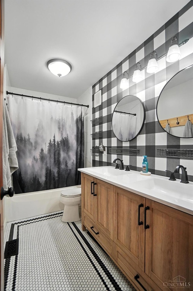 8608 Sunmont Dr, Anderson Twp, OH 45255 - bathroom featuring wallpapered walls, double vanity, and shower / bath combo with shower curtain