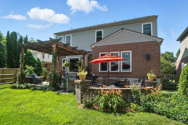 8608 Sunmont Dr, Anderson Twp, OH 45255 - back of house with a pergola, brick siding, and a patio