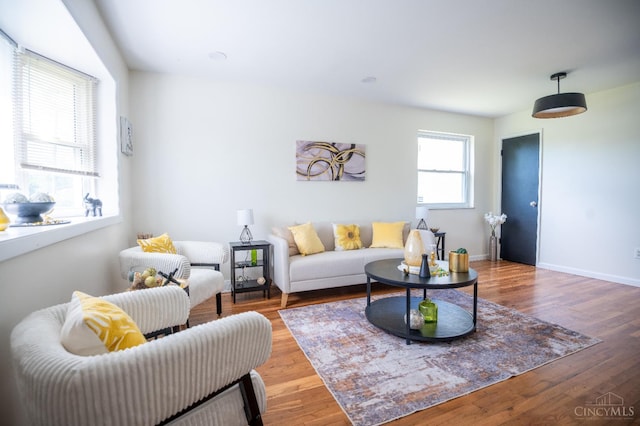 8784 Pippin Rd, Colerain Twp, OH 45251 - living area featuring wood finished floors and baseboards