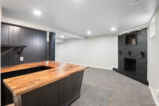 8784 Pippin Rd, Colerain Twp, OH 45251 - bar with recessed lighting, carpet flooring, and a brick fireplace