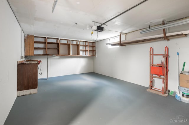 8784 Pippin Rd, Colerain Twp, OH 45251 - garage featuring a garage door opener