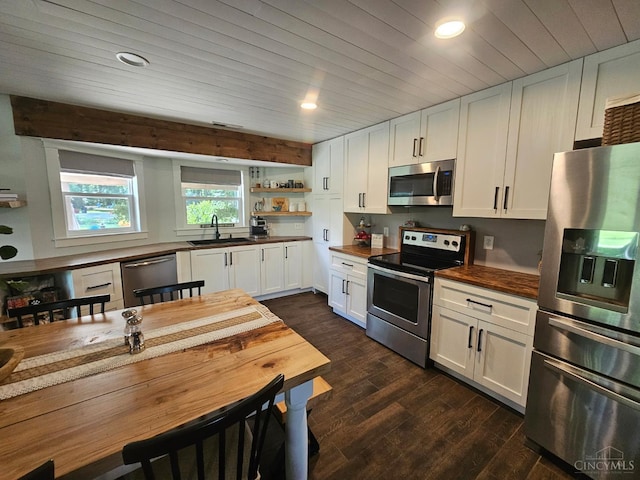 9063 Morrow Woodville Rd, Harlan Twp, OH 45162 - kitchen featuring stainless steel appliances, open shelves, dark wood-style flooring, recessed lighting, and white cabinetry