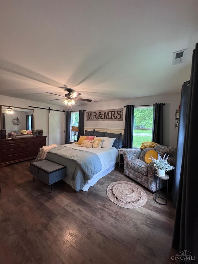 9063 Morrow Woodville Rd, Harlan Twp, OH 45162 - bedroom featuring wood finished floors and a ceiling fan