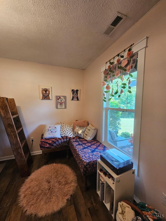 9063 Morrow Woodville Rd, Harlan Twp, OH 45162 - bedroom featuring wood finished floors and a textured ceiling