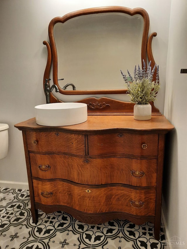 9063 Morrow Woodville Rd, Harlan Twp, OH 45162 - bathroom with vanity and baseboards