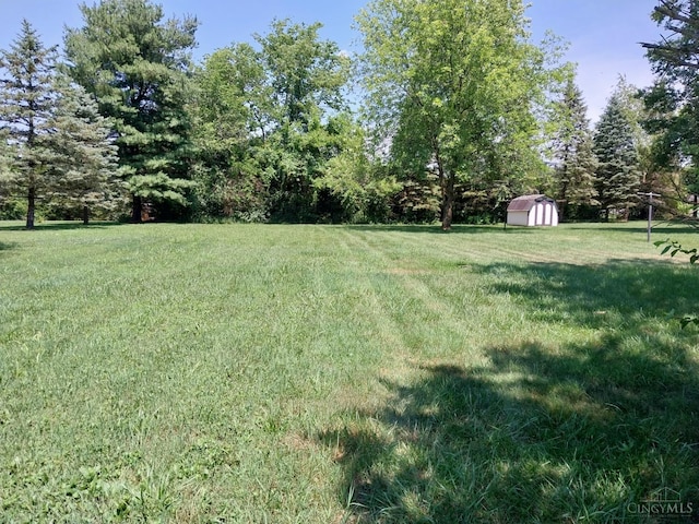 13353 State Route 28 W, Greenfield, OH 45123 - view of green lawn with a shed