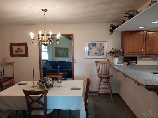13353 State Route 28 W, Greenfield, OH 45123 - dining room featuring a chandelier and carpet