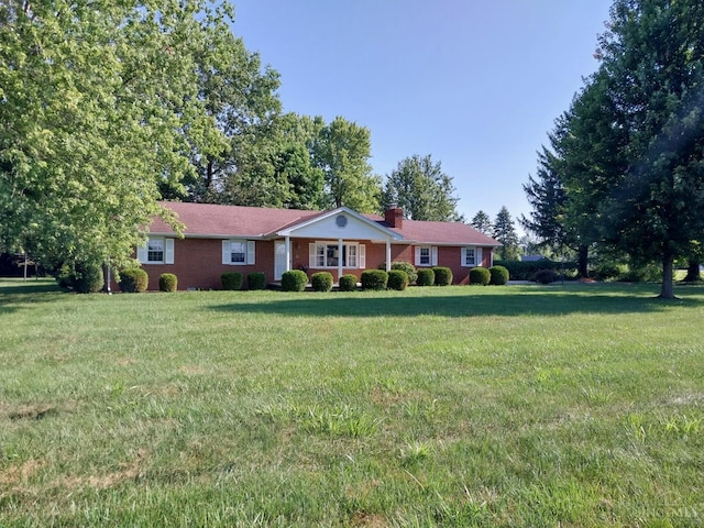 13353 State Route 28 W, Greenfield, OH 45123 - single story home featuring a front lawn, a chimney, and brick siding