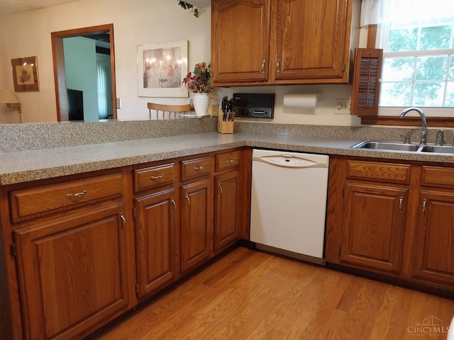 13353 State Route 28 W, Greenfield, OH 45123 - kitchen featuring white dishwasher, brown cabinetry, and light wood finished floors