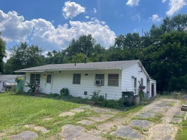 2320 Miles Rd, Colerain Twp, OH 45231 - back of house with a lawn