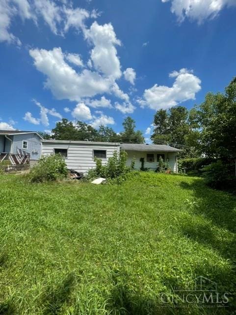 2320 Miles Rd, Colerain Twp, OH 45231 - back of property with a yard