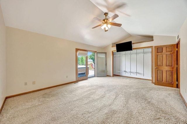 1900 Lani Dr, Washington Twp, OH 45320 - unfurnished bedroom featuring access to outside, carpet, vaulted ceiling, and ceiling fan
