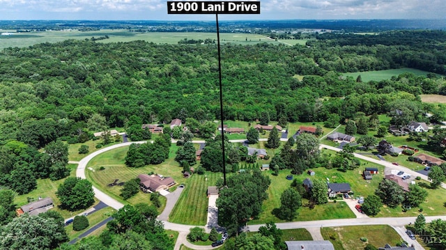1900 Lani Dr, Washington Twp, OH 45320 - drone / aerial view of a heavily wooded area