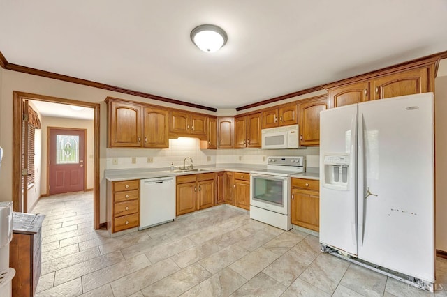 1900 Lani Dr, Washington Twp, OH 45320 - kitchen featuring white appliances, light countertops, brown cabinetry, and ornamental molding