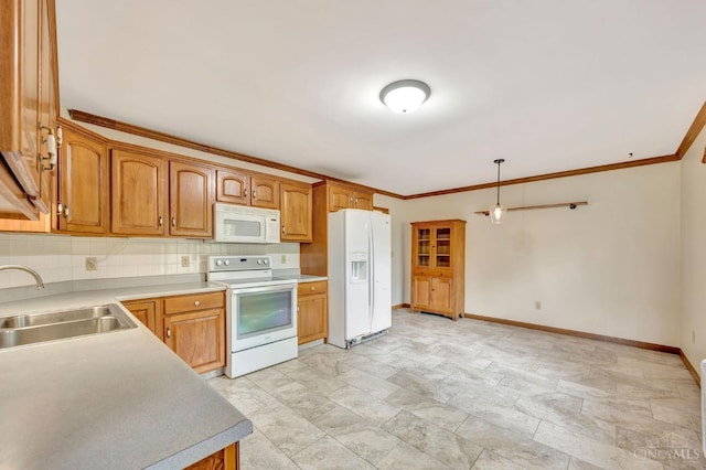 1900 Lani Dr, Washington Twp, OH 45320 - kitchen featuring white appliances, tasteful backsplash, crown molding, stone finish flooring, and hanging light fixtures