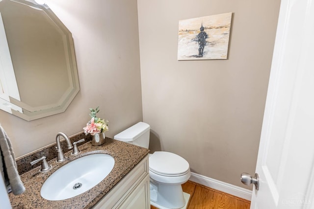 8551 Trillium Ridge Ln, Anderson Twp, OH 45255 - half bath featuring vanity and wood finished floors