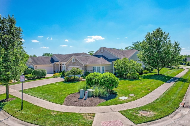1301 Laurel Brook Way, Lebanon, OH 45036 - view of front of home with concrete driveway, a front lawn, and a garage