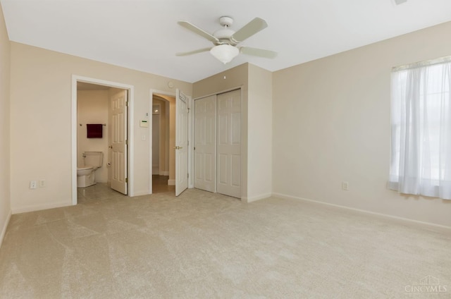1301 Laurel Brook Way, Lebanon, OH 45036 - unfurnished bedroom featuring light carpet, ensuite bathroom, a closet, and a ceiling fan