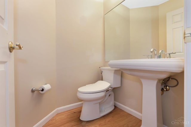1301 Laurel Brook Way, Lebanon, OH 45036 - half bathroom featuring toilet and wood finished floors