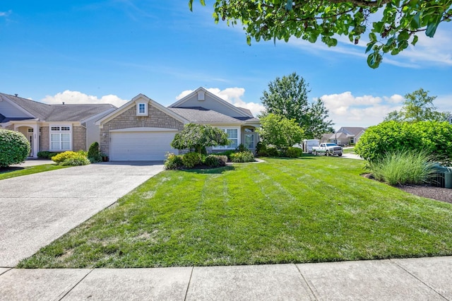 1301 Laurel Brook Way, Lebanon, OH 45036 - view of front of home featuring an attached garage, a front lawn, concrete driveway, and stone siding
