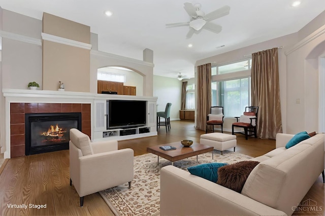 1301 Laurel Brook Way, Lebanon, OH 45036 - living room with light wood-style floors, ceiling fan, a fireplace, and recessed lighting