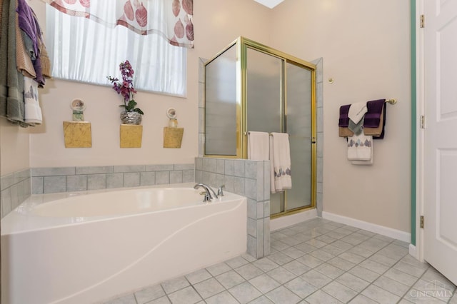 1301 Laurel Brook Way, Lebanon, OH 45036 - bathroom featuring a stall shower, a garden tub, and tile patterned floors
