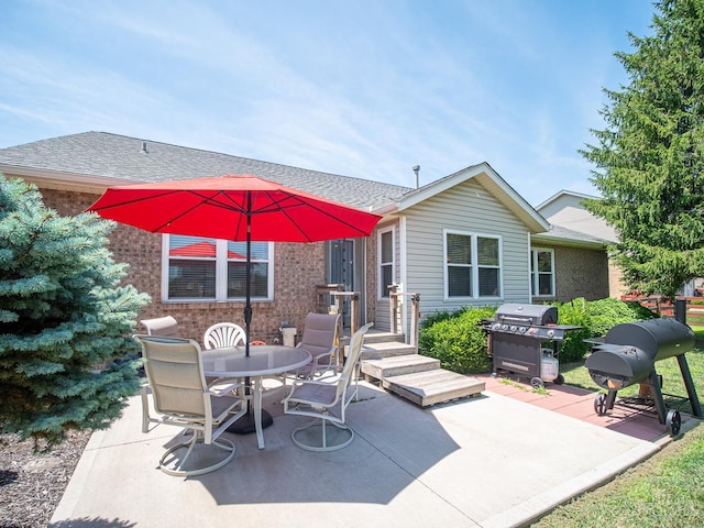7854 Cape Cod Ct, West Chester, OH 45069 - view of patio featuring a grill and outdoor dining space