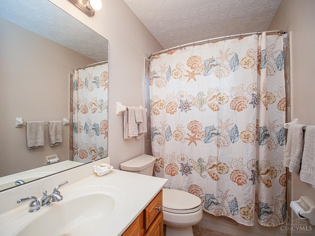 7854 Cape Cod Ct, West Chester, OH 45069 - bathroom featuring vanity, a textured ceiling, a shower with shower curtain, and tile patterned flooring