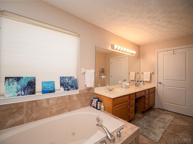 7854 Cape Cod Ct, West Chester, OH 45069 - bathroom with double vanity, a whirlpool tub, a textured ceiling, and tile patterned flooring