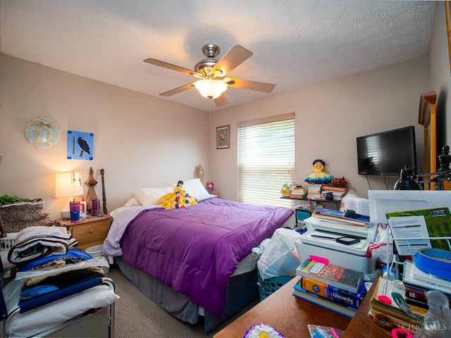 7854 Cape Cod Ct, West Chester, OH 45069 - bedroom with carpet floors, ceiling fan, and a textured ceiling