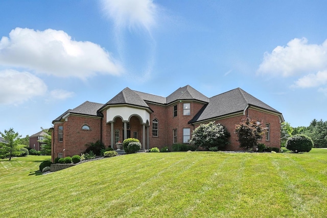 7066 Hearthside Ct, Liberty Twp, OH 45011 - french country home featuring brick siding and a front yard