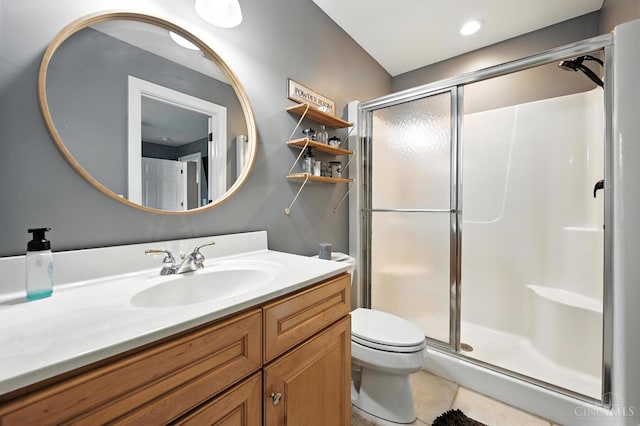 7066 Hearthside Ct, Liberty Twp, OH 45011 - bathroom featuring a stall shower, vanity, and tile patterned flooring
