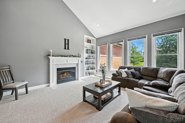 7066 Hearthside Ct, Liberty Twp, OH 45011 - carpeted living room featuring built in shelves, a fireplace, high vaulted ceiling, and recessed lighting
