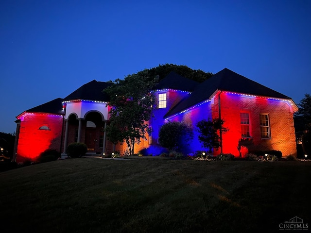 7066 Hearthside Ct, Liberty Twp, OH 45011 - view of front of house featuring a lawn and brick siding